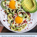 two eggs in zucchini noodles with avocado and red pepper flakes