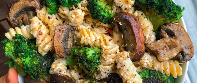 Chickpea pasta, broccoli, pasta sauce, mushrooms, in a bowl