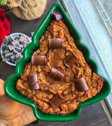 sweet potato bread in a christmas ramekin on a brown wood board