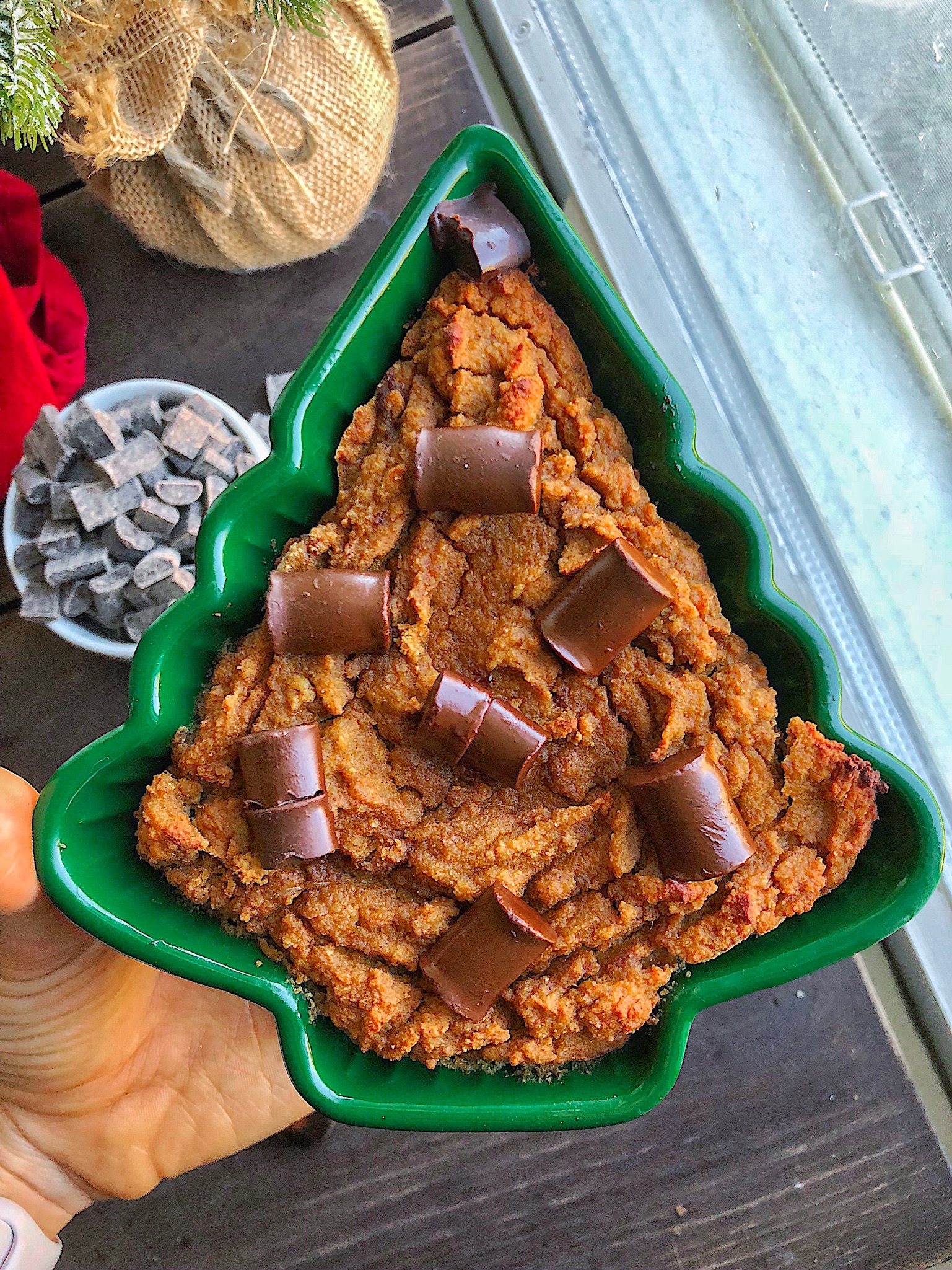 sweet potato bread in a christmas ramekin on a brown wood board