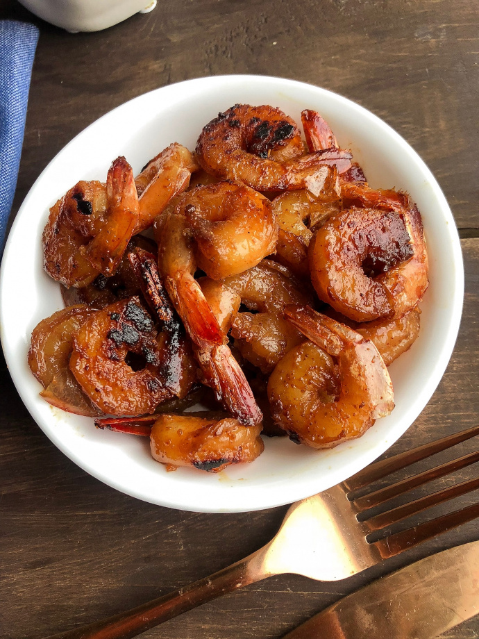 Honey chipotle shrimp on a white plate