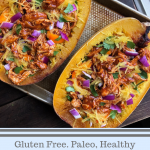 Paleo bbq chicken stuffed spaghetti squash on a silver pan