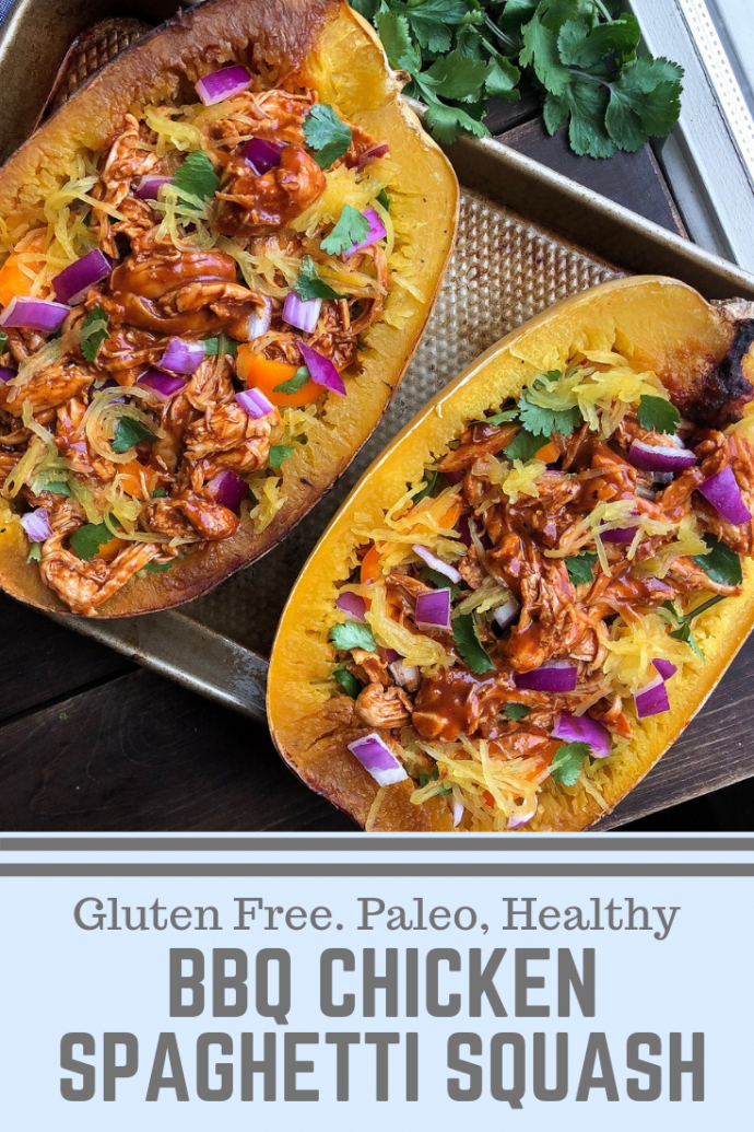 Paleo bbq chicken stuffed spaghetti squash on a silver pan