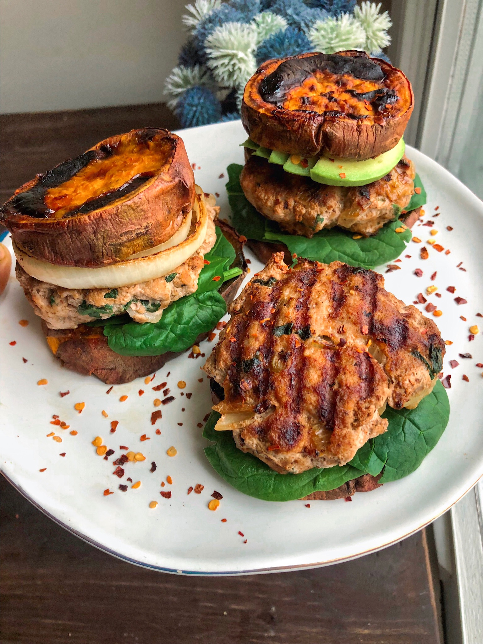 paleo turkey burgers on a black cast iron grill