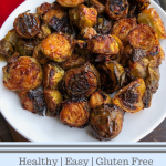 barbecue brussel sprouts on a white plate.