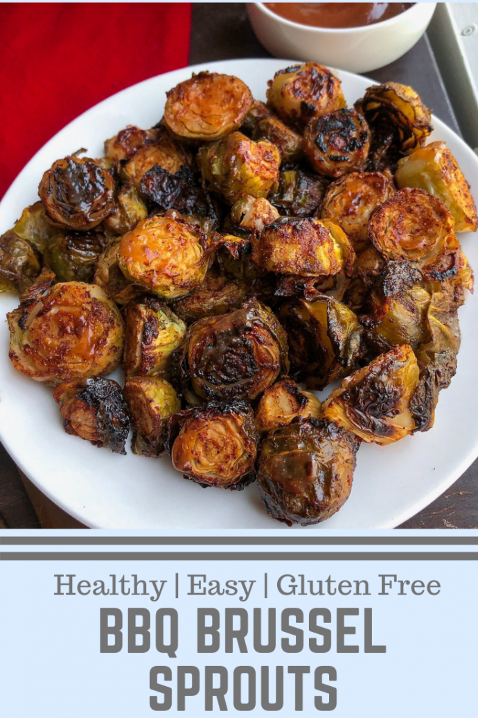 barbecue brussel sprouts on a white plate.