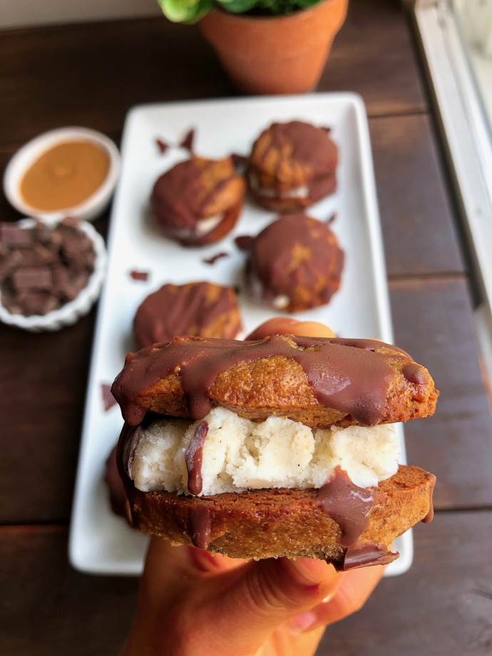ice cream sandwich with peanut butter cookies on a white plate