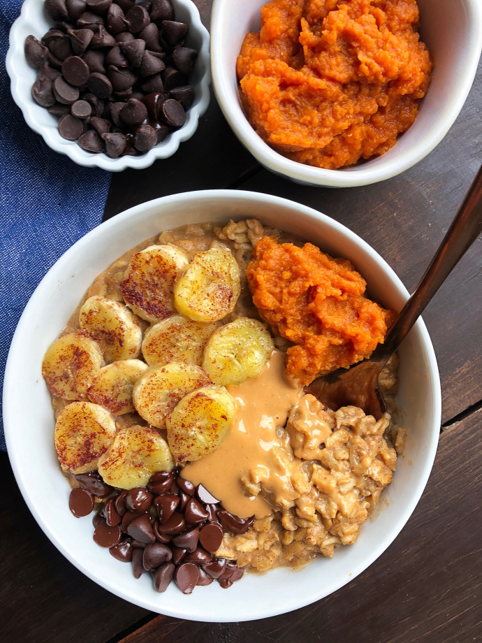 healthy pumpkin stovetop oatmeal in a white bowl