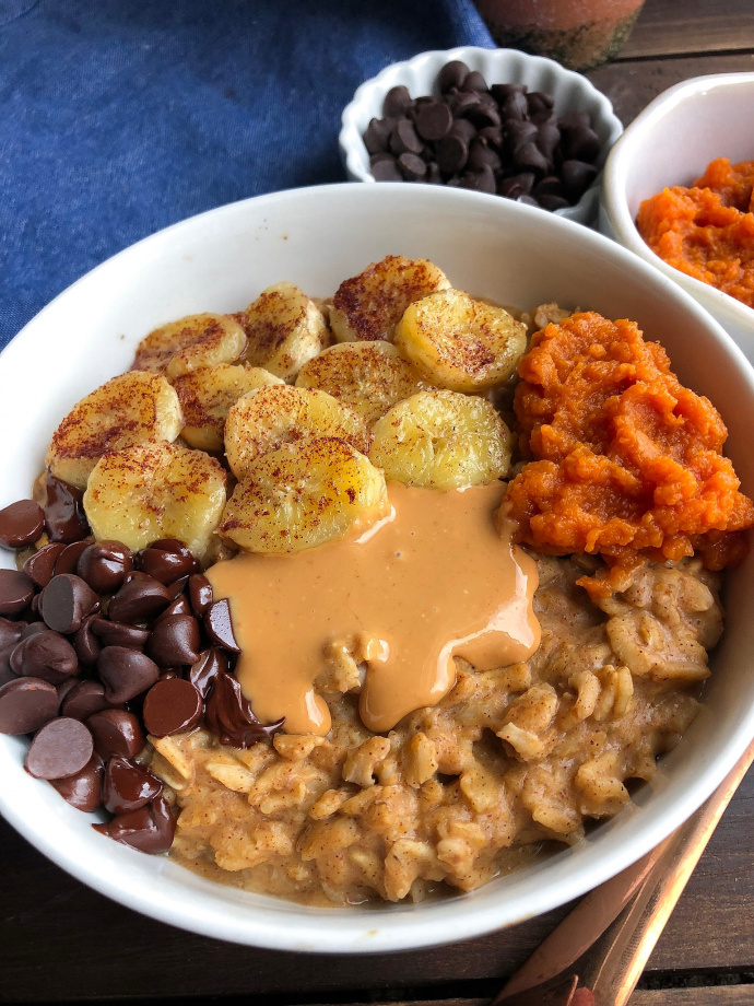 healthy pumpkin stovetop oatmeal in a white bowl