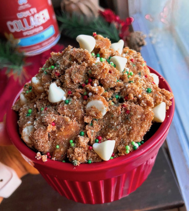 gingerbread cookie dough with white chocolate chips and sprinkles in a red jar