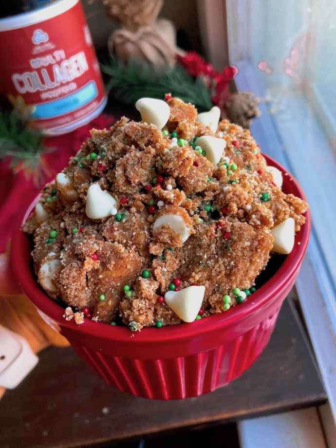 gingerbread cookie dough with white chocolate chips and sprinkles in a red jar