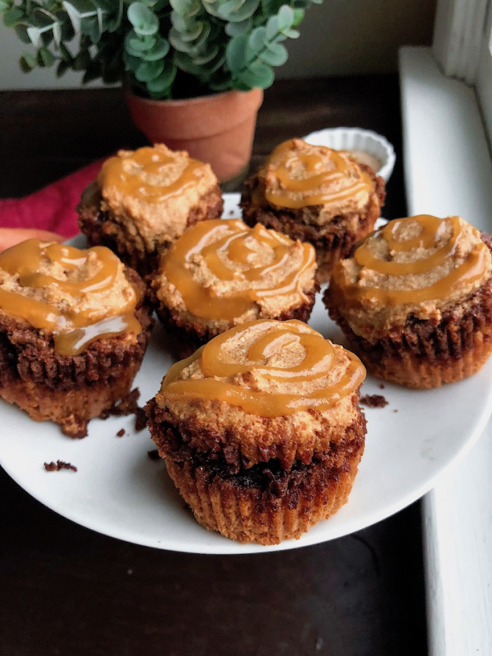 paleo, gluten free cinnamon roll muffins with an easy swirled icing on top.