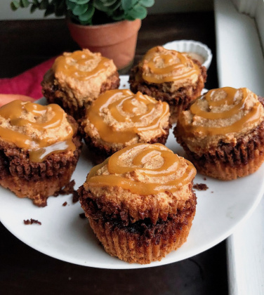 paleo, gluten free cinnamon roll muffins with an easy swirled icing on top.