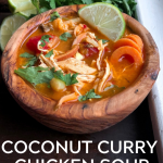 Coconut Curry Chicken Soup in a wooden bowl. Paleo, Gluten free, whole30