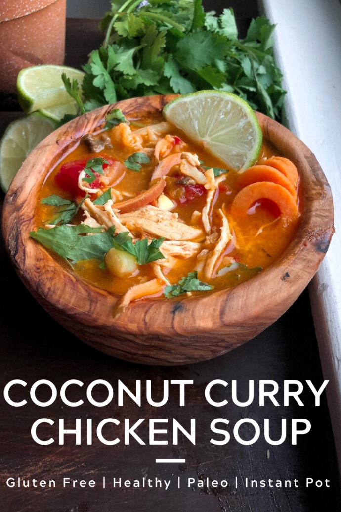 Coconut Curry Chicken Soup in a wooden bowl. Paleo, Gluten free, whole30