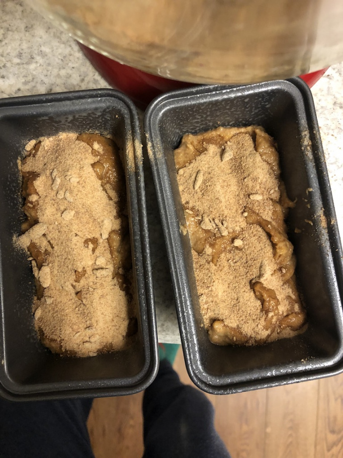 cinnamon banana bread with a cinnamon swirl on a white plate