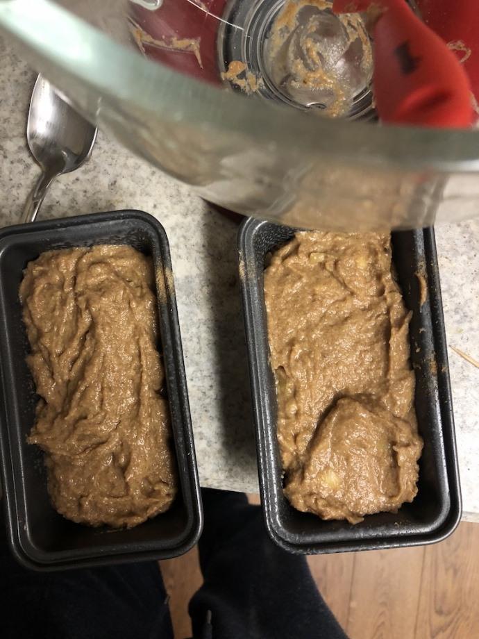 cinnamon banana bread with a cinnamon swirl on a white plate