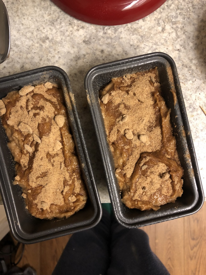 cinnamon banana bread with a cinnamon swirl on a white plate