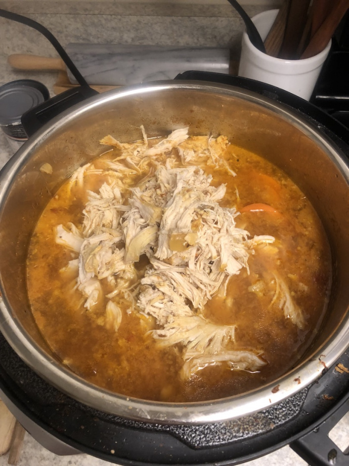 shredded chicken in the soup 