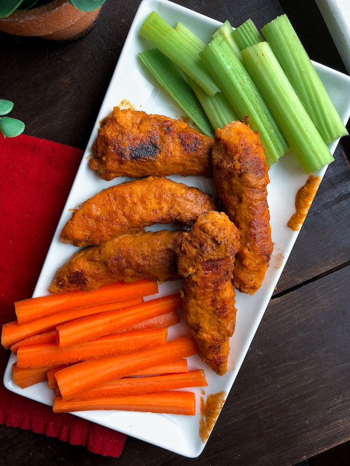 baked buffalo chicken tenders with carrots and celery