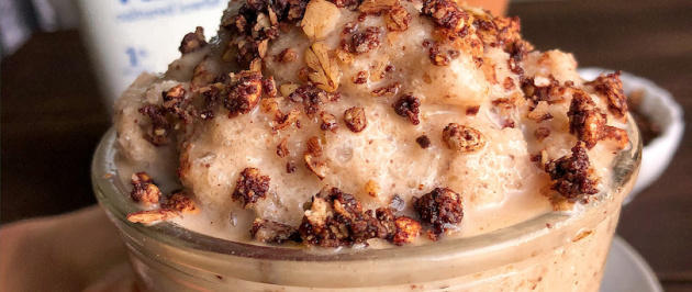 Banana Cookie Dough Smoothie in a glass jar with granola on top