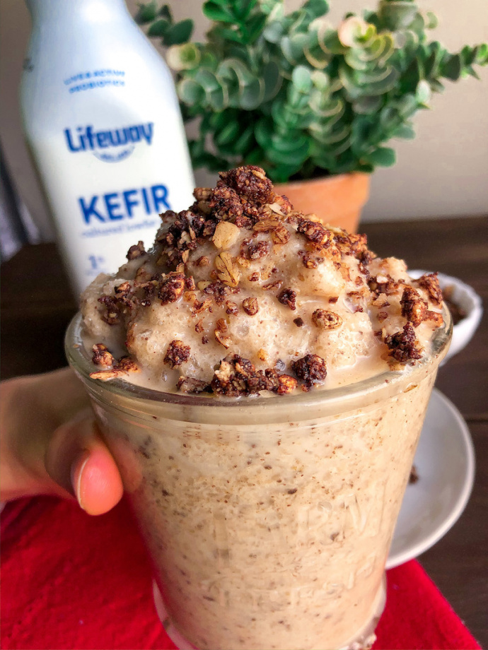 Banana Cookie Dough Smoothie in a glass jar with granola on top