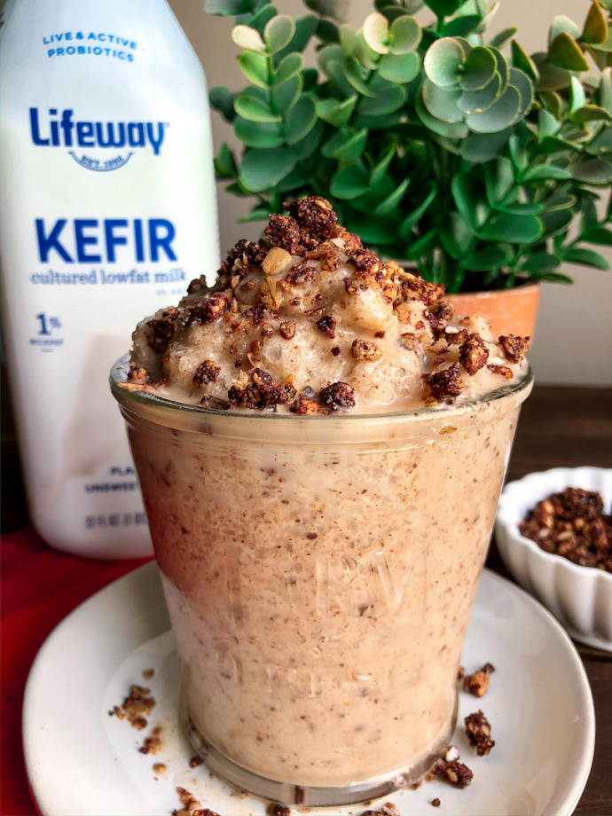 Banana Cookie Dough Smoothie in a glass jar with granola on top