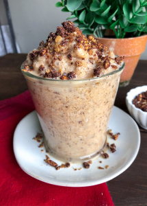 Banana Cookie Dough Smoothie in a glass jar with granola on top