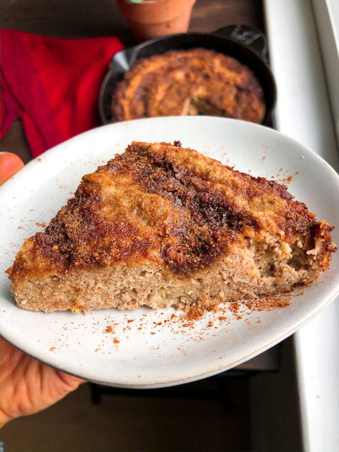 cinnamon swirl banana bread in a cast iron skillet