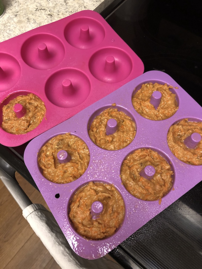 Healthy carrot cake donuts in a donut pan