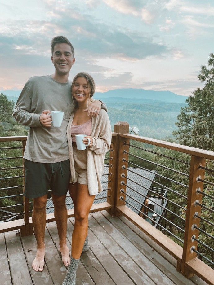 picture of couple in front of mountains